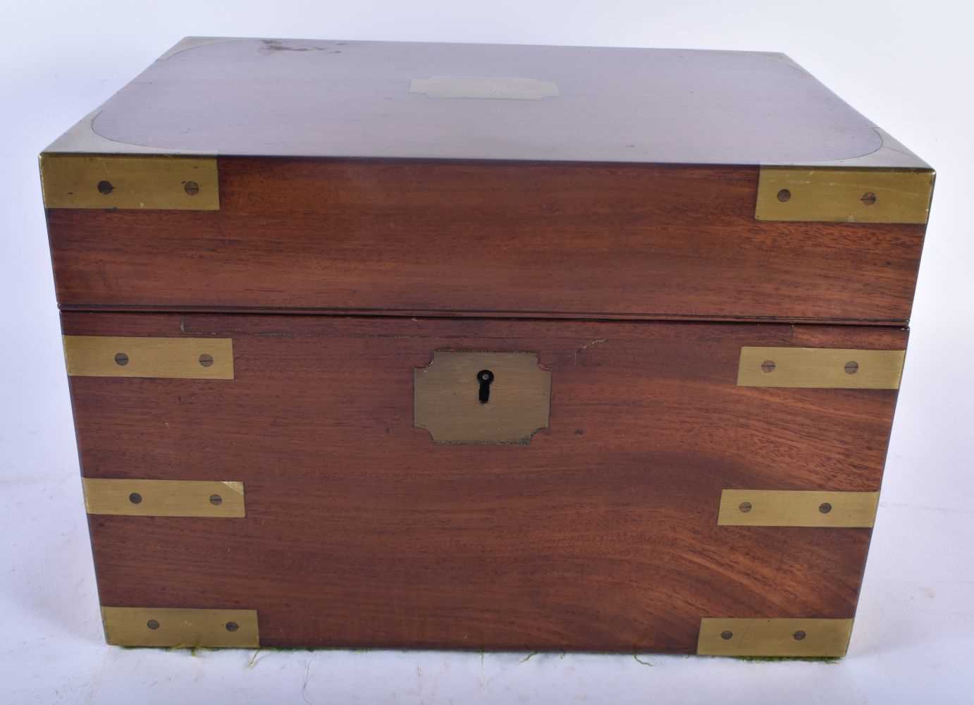 A RARE LARGE 19TH CENTURY MAHOGANY BRASS BOUND CAMPAIGN JEWELLERY BOX with fully fitted interior. 28