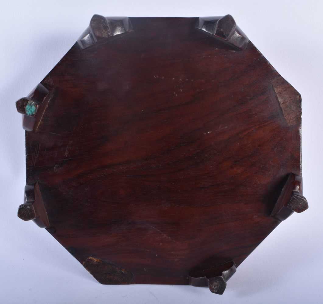 A LARGE 19TH CENTURY CHINESE CARVED WOOD HEXAGONAL STAND Qing, possibly Huanghuali. 19 cm wide. - Image 8 of 8