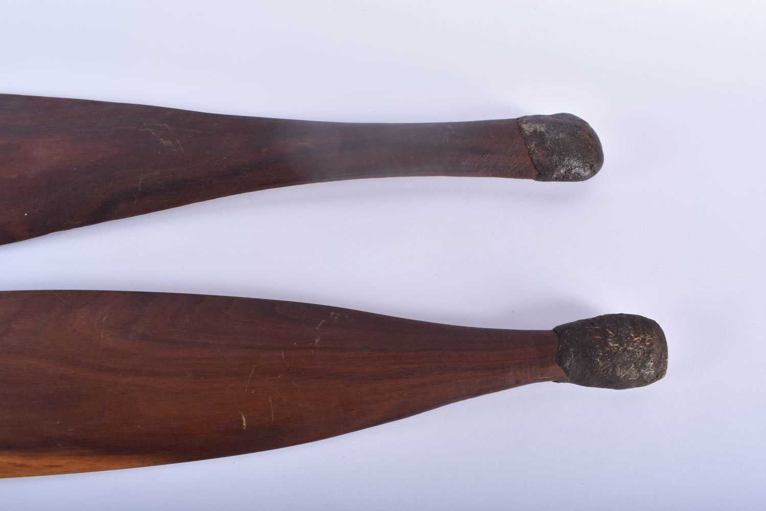 TWO ABORIGINAL TRIBAL CARVED WOOD SHORT PADDLES engraved with motifs. 70 cm long. (2) - Image 5 of 5