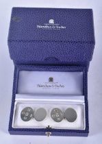 A Cased and Boxed Pair of Silver Cufflinks by Philip Kydd for Hamilton & Inches of London.