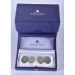 A Cased and Boxed Pair of Silver Cufflinks by Philip Kydd for Hamilton & Inches of London.