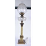 A LARGE 19TH CENTURY EUROPEAN ONYX AND BRONZE COUNTRY HOUSE OIL LAMP. 80 cm high.