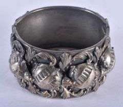 A Heavily Decorated Cuff Bangle in the Arts and Crafts Style. Internal Diameter 5.7cm, weight 84g