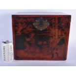 A LARGE CHINESE QING DYNASTY RED LACQUERED COUNTRY HOUSE BOX decorated with figures in landscapes.