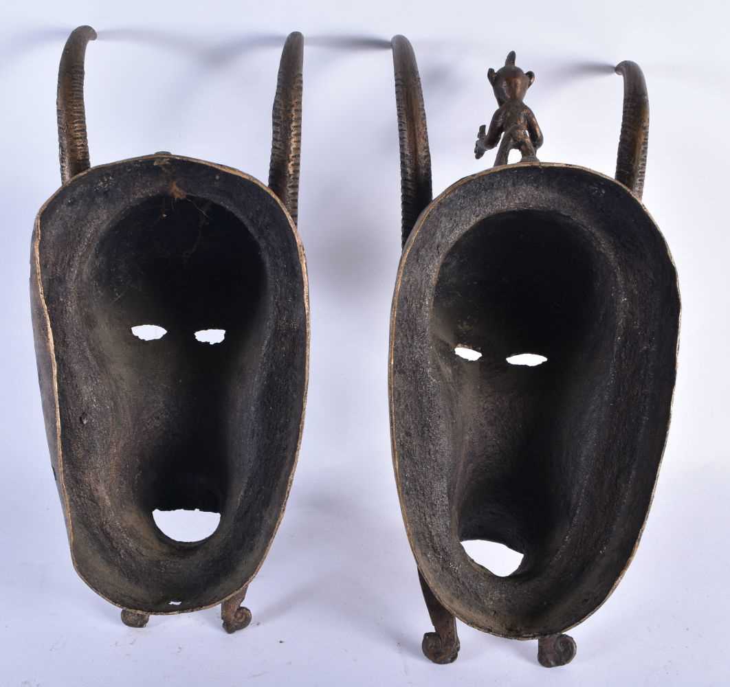 A PAIR OF AFRICAN BRONZE TRIBAL MASKS. 35 cm x 10 cm. - Image 5 of 5