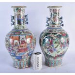 A LARGE PAIR OF 19TH CENTURY CHINESE CANTON FAMILLE ROSE TWIN HANDLED VASES Qing. 42 cm x 18cm.