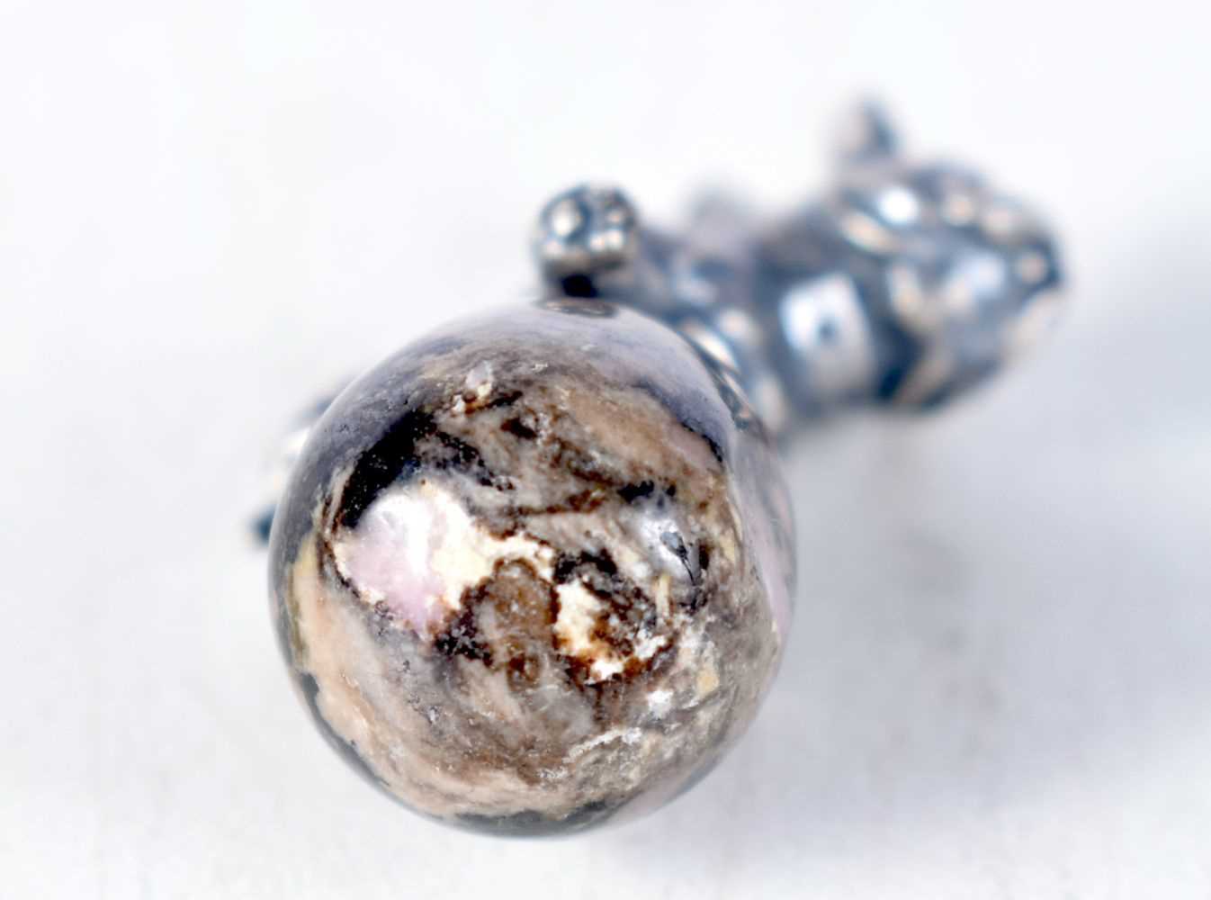 A Continental Quartz Egg Pendant Mounted with a Silver Dog with Gem Set Eyes. Stamped 84, 2.8 cm x 2 - Image 3 of 3