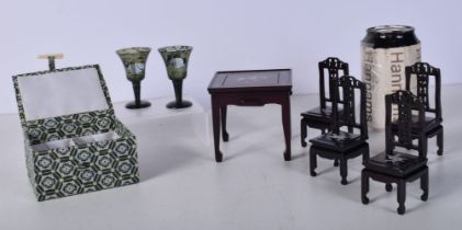A Chinese miniature hardwood table and chairs with mother of pearl inlay together with a pair of