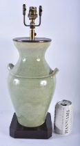 A CHINESE REPUBLICAN PERIOD TWIN HANDLED CELADON COUNTRY HOUSE LAMP. 44 cm x 15 cm.