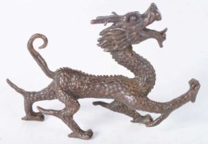 A Japanese Bronze Dragon. 10.7cm x 7.1cm x 2.2 cm, weight 158.6g