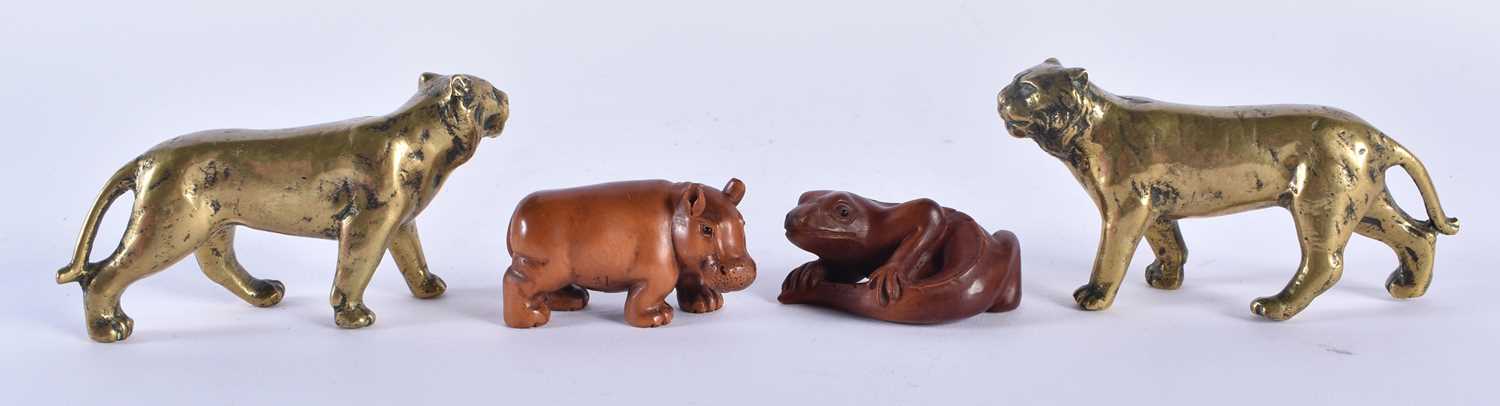 A PAIR OF 19TH CENTURY JAPANESE MEIJI PERIOD BRONZE TIGERS together with two boxwood netsukes.