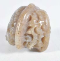 A Chinese Carved Jade Walnut. 3.6 cm x 4.1cm x 3.9cm, weight 61.7g