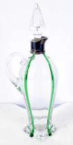 A Victorian Moulded Glass Decanter with Green Glass Drip Decoration and Silver Mounts Hallmarked