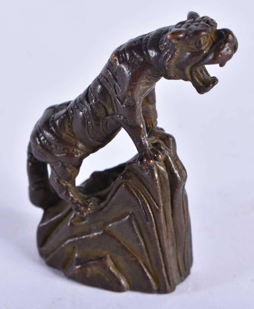 A JAPANESE BRONZE TIGER OKIMONO. 72 grams. 5 cm x 4 cm.