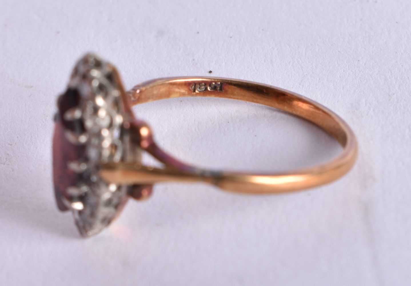 AN 18CT GOLD DIAMOND AND GARNET RING. M. 3 grams. - Image 2 of 2