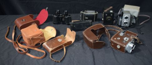 A collection of cased Vintage Cameras together with a cased pair of Binoculars (6).