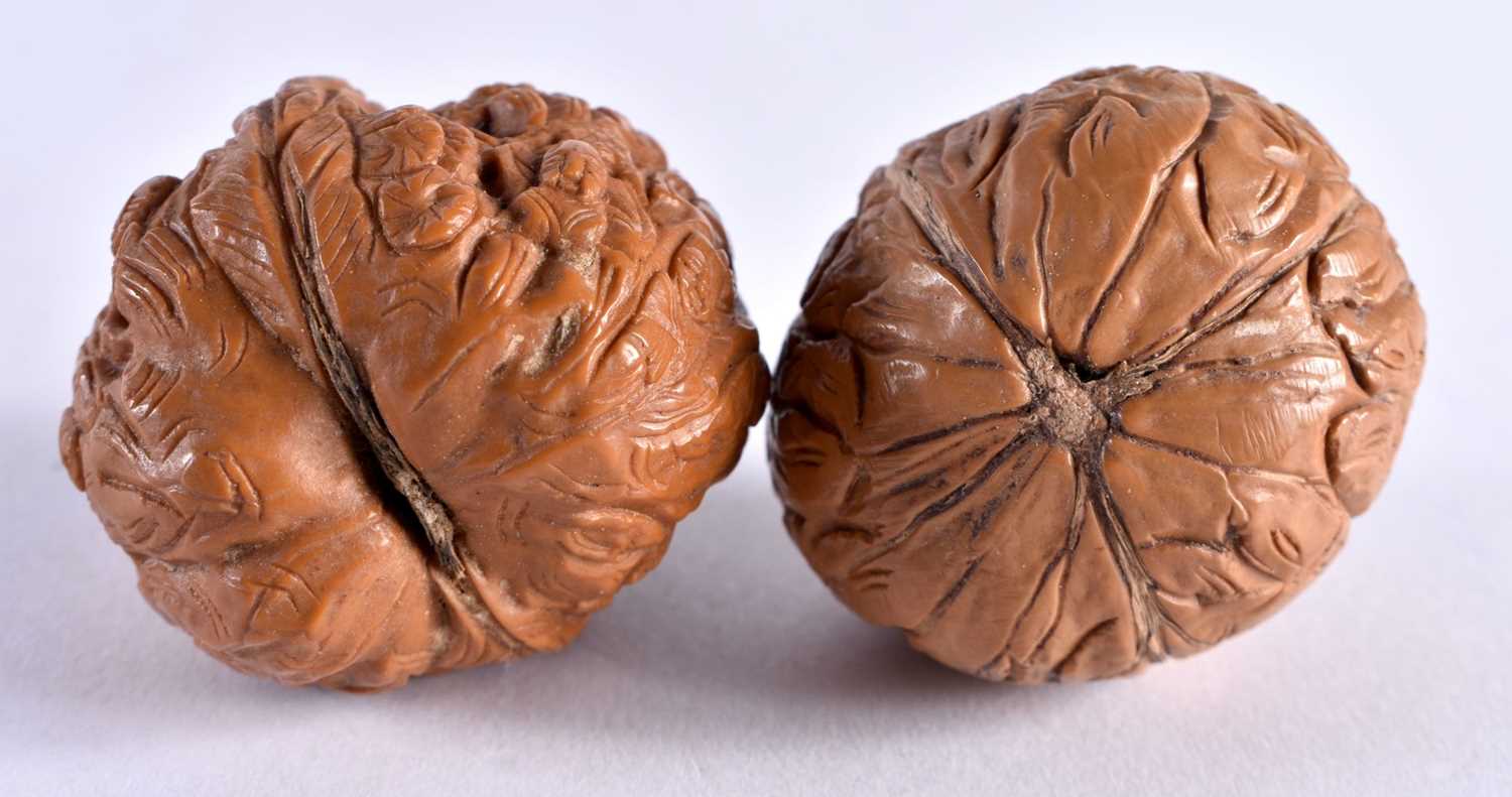 A COLLECTION OF 19TH/20TH CENTURY CHINESE CARVED NUTS Late Qing, in various forms and sizes. 5 cm - Image 3 of 7