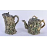 A VICTORIAN MAJOLICA TEAPOT AND COVER together with a matching pewter mounted jug. Largest 20 cm x