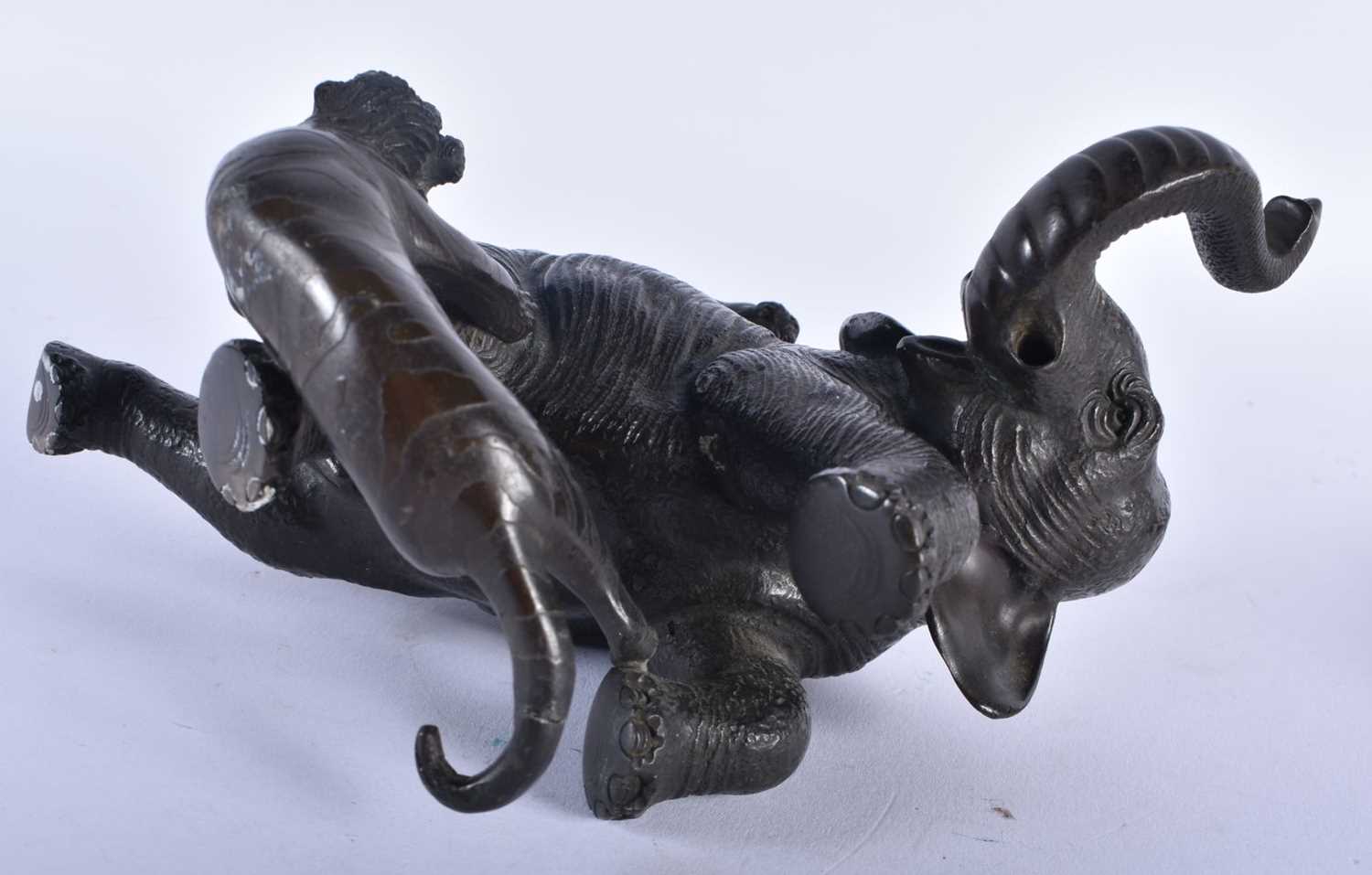 A 19TH CENTURY JAPANESE MEIJI PERIOD BRONZE OKIMONO modelled as an elephant being attacked by - Image 8 of 8