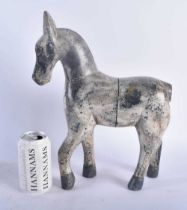 A LARGE EARLY 20TH CENTURY CARVED FOLK ART PAINTED WOOD HORSE modelled standing. 36 cm x 22 cm.