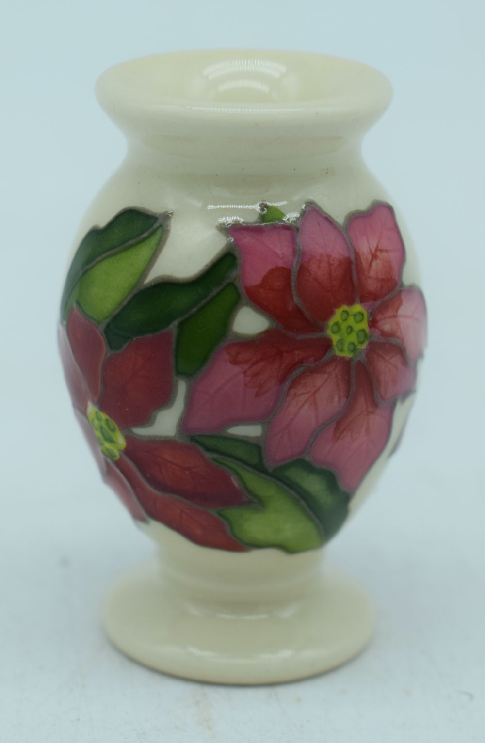 Boxed Moorcroft Seasonal Flower Collection Poinsettia Miniature Vase 2020 together with a Slipper - Image 9 of 10