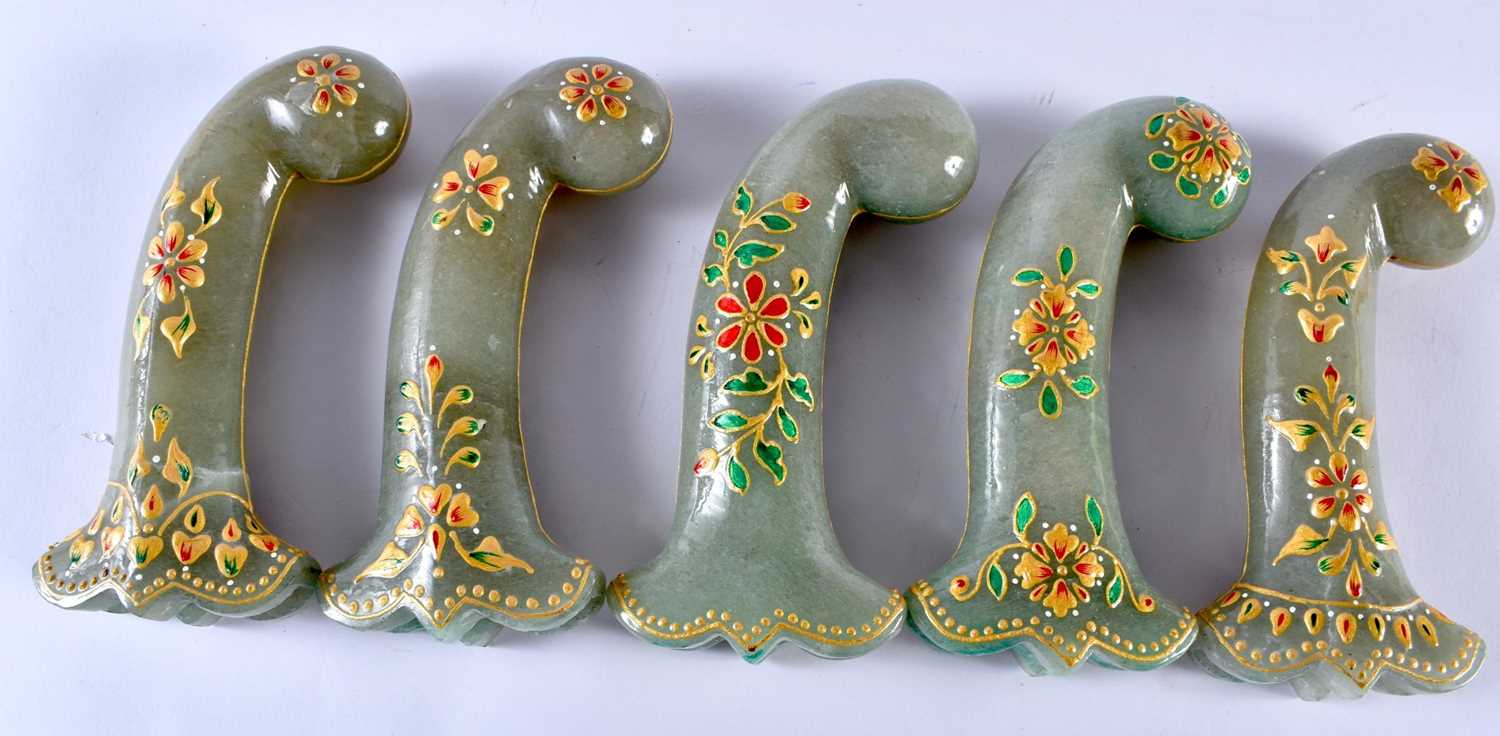 A SET OF FIVE MIDDLE EASTERN QAJAR LACQUER HARDSTONE DAGGER HANDLES overlaid with foliage and vines. - Image 5 of 6