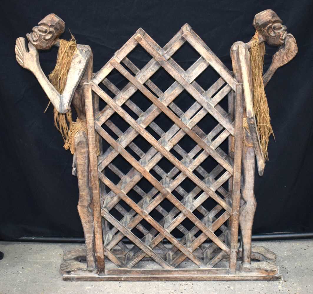 A large Tiki art wooden wine rack 103 x 92 cm. - Image 2 of 14