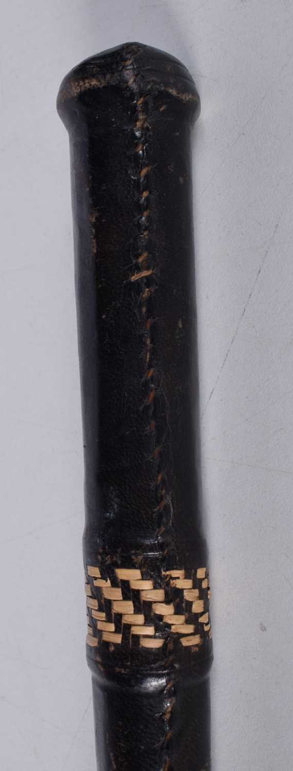 A wooden walking cane with a 9 Ct gold collar stamed 1928 together with another leather encased - Image 6 of 14