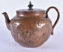 AN EARLY 20TH CENTURY CHINESE PAKTONG COPPER TEAPOT AND COVER Late Qing/Republic. 16.5 cm wide.