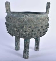 A CHINESE QING DYNASTY TWIN HANDLED BRONZE ARCHAIC CENSER. 875 grams. 19 cm x 15 cm.