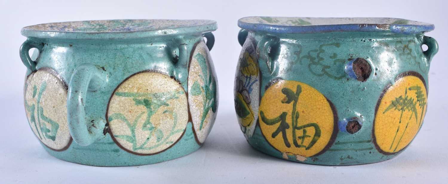 A PAIR OF 19TH CENTURY CHINESE ENAMELLED YIXING POTTERY TEAPOTS painted with flowers. 15 cm wide. - Image 2 of 5