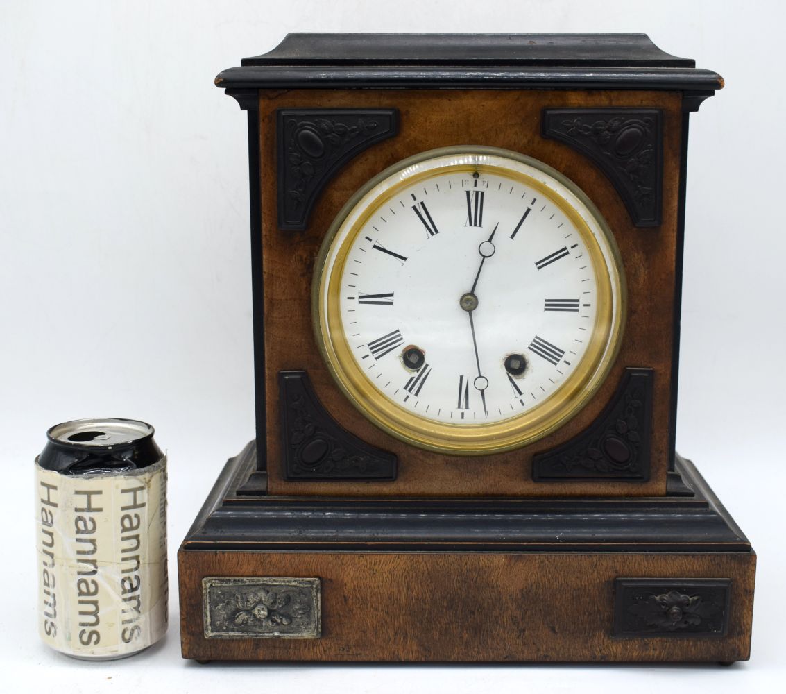 A wooden Mid Century mantle clock with metal enamelled face 53 x 29 x 15 cm.