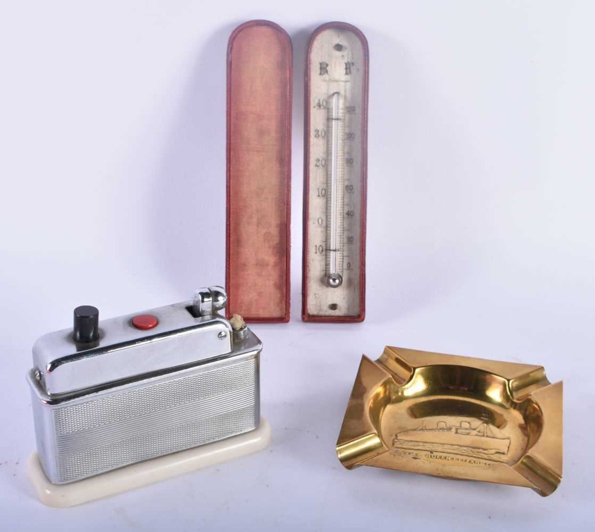 AN ANTIQUE POCKET THERMOMETER together with a brass RMS Queen Elizabeth ashtray & a vintage bakelite