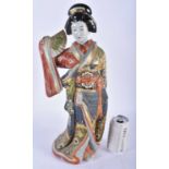 A LARGE EARLY 20TH CENTURY JAPANESE MEIJI PERIOD SATSUMA TYPE PORCELAIN FIGURE OF A GEISHA