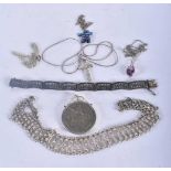 Seven items of Silver Jewellery including a Bracelet, 3 Pendant Necklaces, a Chain, a Silver Mounted