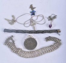 Seven items of Silver Jewellery including a Bracelet, 3 Pendant Necklaces, a Chain, a Silver Mounted