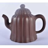 A CHINESE YIXING POTTERY TEAPOT AND COVER 20th Century. 14 cm x 12 cm.