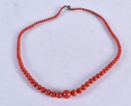A Blood Coral Bead Necklace. 53cm long, Largest Bead 10mm, weight 28g