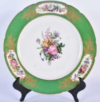 Early 19th century French porcelain plate painted by Jean-Pierre Feuillet with a central bouquet and