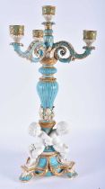 A LARGE 19TH CENTURY ENGLISH SEVRES STYLE PORCELAIN BLUE GLAZED CANDELABRA formed with three cherubs