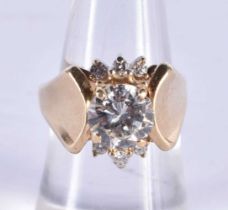 A LARGE 14CT GOLD 1.5 CT DIAMOND SOLITAIRE RING. M. 8.4 grams.
