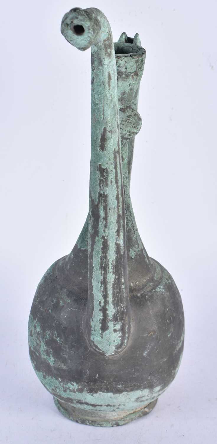 An Early Middle Eastern Copper Ewer. 35cm x 17cm - Image 2 of 3