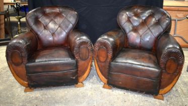 A pair of 1930's Parisian leather club chairs 89 x 93 cm.