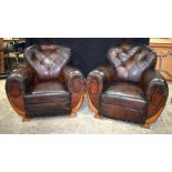 A pair of 1930's Parisian leather club chairs 89 x 93 cm.