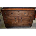 An impressive antique mahogany dresser with 6 drawers and two large front opening cabinets 108 x 164