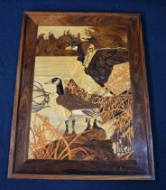 A marquetry panel of geese 63 x 47 cm.