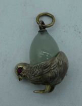 A SILVER AND JADE CHICK PENDANT. 6 grams. 3 cm x 2 cm.