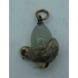 A SILVER AND JADE CHICK PENDANT. 6 grams. 3 cm x 2 cm.