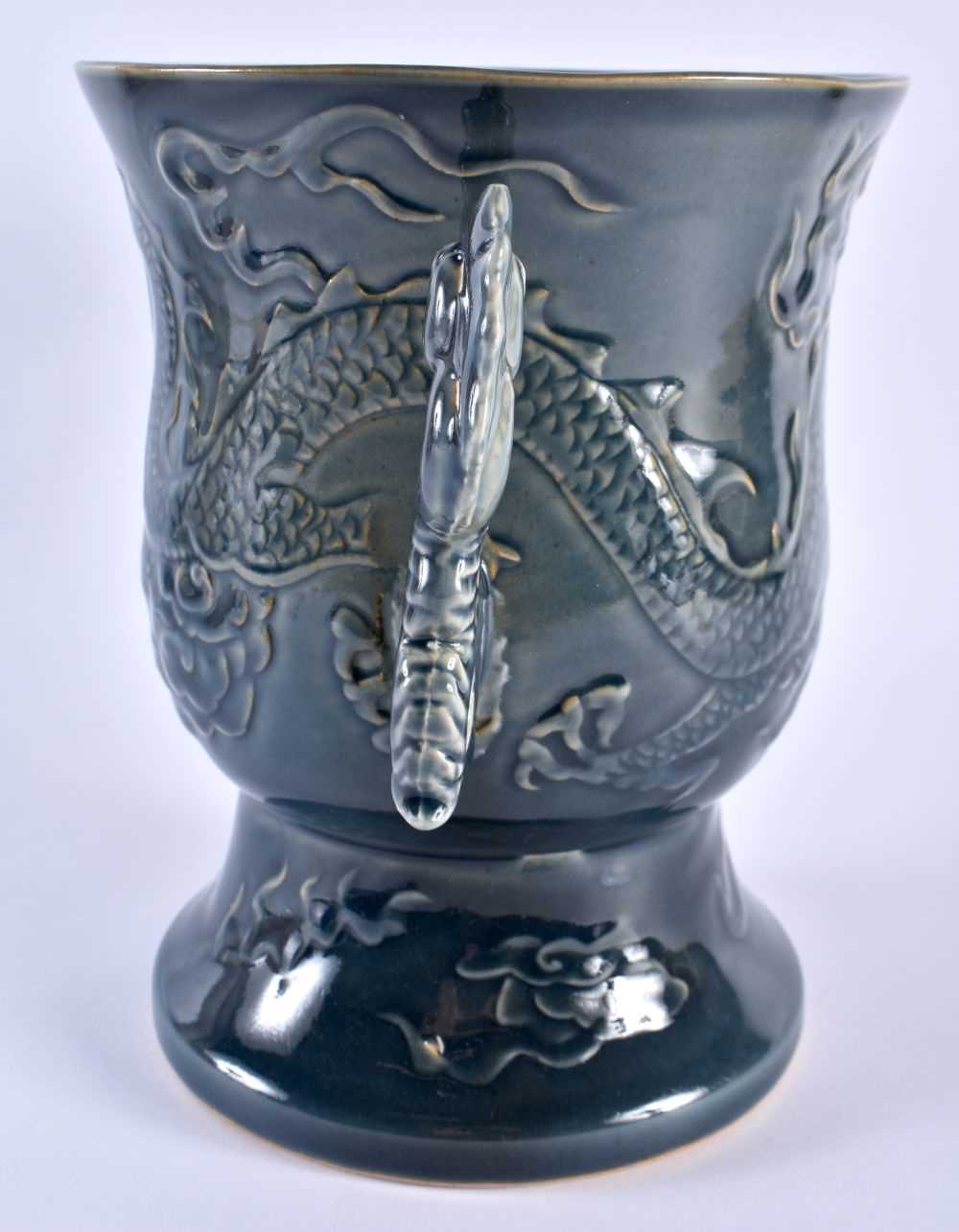 A LARGE CHINESE QING DYNASTY TWIN HANDLED BLUE STONEWARE PORCELAIN VASE decorated in relief with - Image 2 of 6