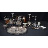 A large collection of Silver plated and other metal items, Candle sticks, Tea pots,trays etc 46 x